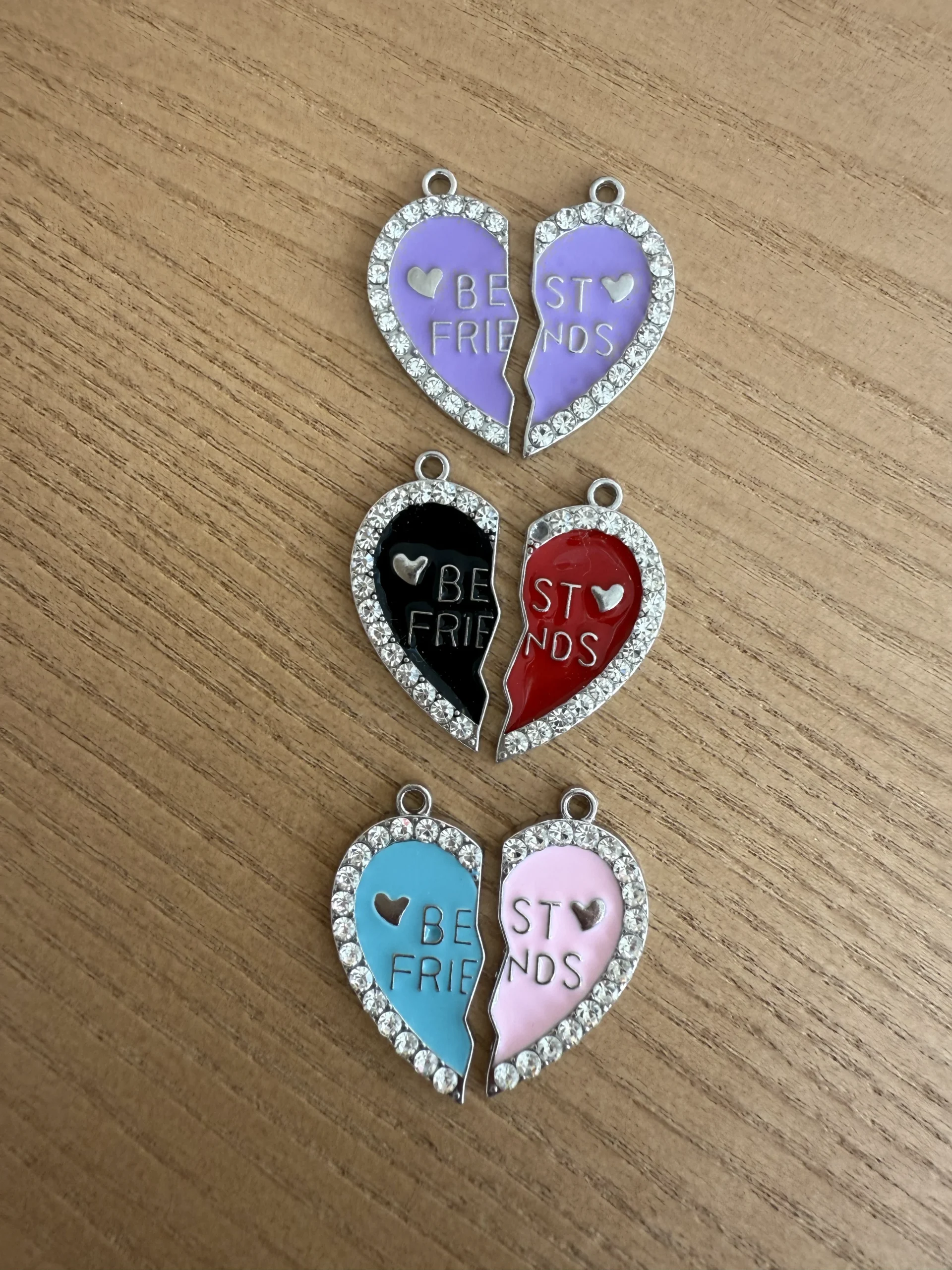 Matching bestie heart-shaped pendant sets in different vibrant colors